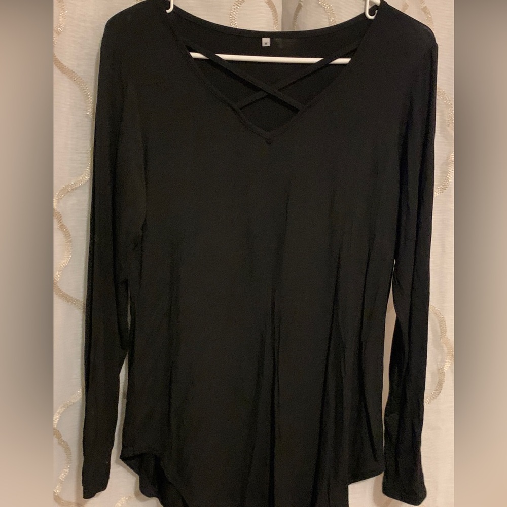 Black, med long sleeve silky look stretch material crisscross  chest design top